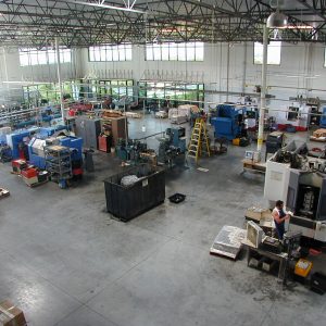 From a similar position but looking toward the west end of the building, the Mazak FH-4800 can be seen in the lower right. To the left is the CNC lathe department. 